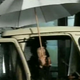 Illustration for article titled The crazy golf cart Moammar Qaddafi is driving is a Tuk-Tuk